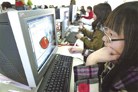 Staff at a Nanjing-based animation design and manufacturing company work on computers under an outsourcing deal with a Japanese company. [China Daily]