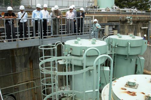 In this May 26, 2011 photo released by the international atomic energy agency, or IAEA, members of the iaea fact-finding team in Japan visit seawater intake pumps at Tokai Dai-ni nuclear plant in Tokaimura, northeast of Tokyo. 
