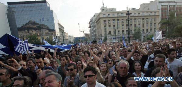 Greek protesters hold a demonstration in front of the old university in Athens, Greece, on May 31, 2011. The protest was organized by Greek academics against austerity measures and was joined by thousands of Greek citizens. [Xinhua]