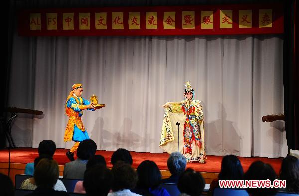 Performers play Peking Opera during a Chinese culture fair at Chinese embassy to Japan in Tokyo, captial of Japan, May 31, 2011. Chinese embassy to Japan held the Chinese culture fair and a charity sale for disaster areas hit by the earthquake and tsunami on Tuesday. [Xinhua]