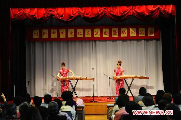 Performers play traditional Chinese instruments during a Chinese culture fair at Chinese embassy to Japan in Tokyo, captial of Japan, May 31, 2011. Chinese embassy to Japan held the Chinese culture fair and a charity sale for disaster areas hit by the earthquake and tsunami on Tuesday. [Xinhua] 