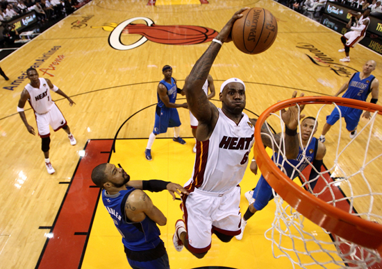 LeBron James takes a dunk against the Dallas Mavericks during the NBA Finals game 1 May 31, 2011 at the AmericanAirlines Arena in Miami, Florida.