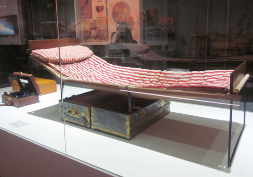A folding camp bed trunk circa 1885 is one of the more adventurous examples of Louis Vuitton luggage at the Voyages exhibition. [Photo:CRIENGLISH.com]