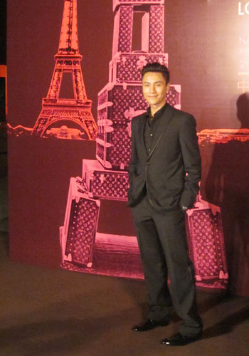 Actor Chen Kun attends the opening ceremony of Louis Vuitton Voyages at the National Museum of China on Monday, May 30, 2011. [Photo:CRIENGLISH.com]