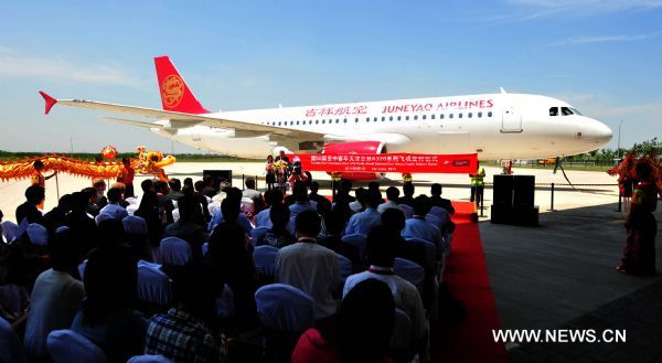 Airbus executives and engineers attend the delivery of an Airbus A320 series plane in Tianjin, north China, June 1, 2011. The 50th Airbus A320 series plane that rolls off Tianjian assembly line was delivered to Juneyao Airlines here Wednesday. The Airbus 320 assembly line in Tianjin, the first for Airbus outside Europe, is a joint venture between Airbus, the Aviation Industry Corp. of China (AVIC), and Tianjin Bonded Zone Investment Co., and went into production in September 2008. (Xinhua/Liu Haifeng) (ljh) 