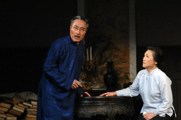 Actors perform in the well-known Chinese play 'Thunderstorm' in Moscow, Russia, June 2, 2011. The play staging by Beijing People's Art Theater made its debut in Russia on Thursday on the invitation of the Chekhov International Theater Festival.