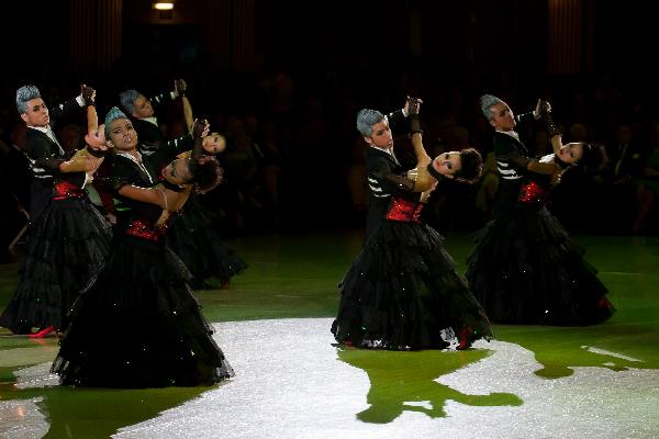 Members of the Guangzhou Arts School perform during the Ballroom Formation competition of the Blackpool Dance Festival in Blackpool, Britain, June 1, 2011. The annual Blackpool Dance Festival includes one of the most prestigious international standard dancing competition of the world. 