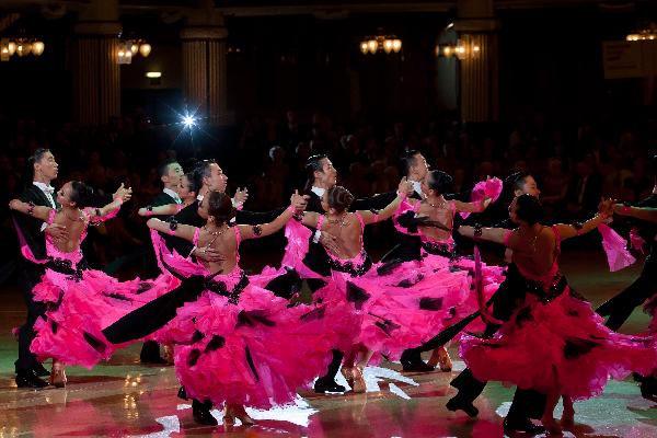 Members of the Beijing Dance Academy perform during the Ballroom Formation competition of the Blackpool Dance Festival in Blackpool, Britain, June 1, 2011. The annual Blackpool Dance Festival includes one of the most prestigious international standard dancing competition of the world. 