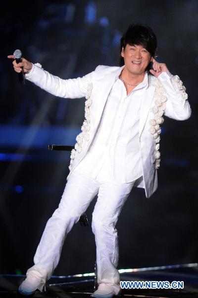 Singer Wakin Chau performs during his solo concert in Taipei, southeast China's Taiwan, June 4, 2011. [Xinhua]