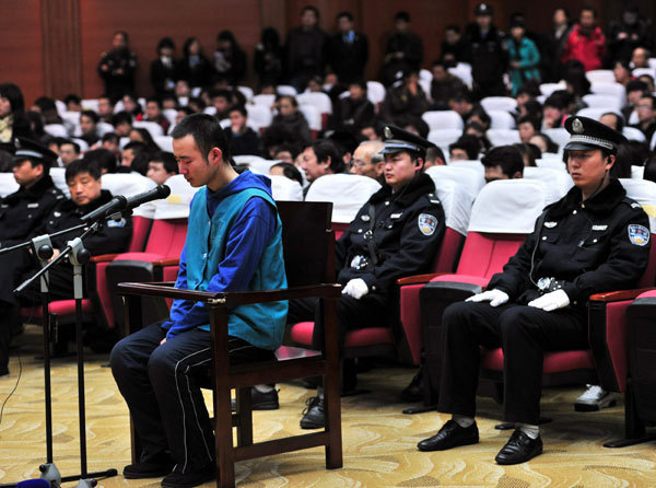 Yao Jiaxin appears at the Xi'an Intermediate People's Court for a hearing on March 23. [Photo/Asianewsphoto] 