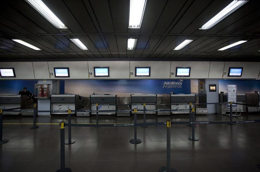 The check-in area is empty as flights are cancelled due to the volcanic ash spreading, at the Jorge Newbery airport in Buenos Aires, Argentina, June 7, 2011. Ash produced by eruption of the Chilean Puyehue volcano have caused the cancellation of many flights in Buenos Aires, as the ash clouds were spreading over the city. [Xinhua/Martin Zabala]