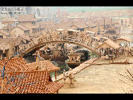 Photo shows the view in a clay sculpture park built to simulate the scene in a renowned Chinese scroll painting 'Riverside Scene on the Qingming Festival' in Changzhuang Township, Tangshan City of north China's Hebei Province, June 3, 2011. The park, with hundreds of handmade sculptures, was officially open to the public on Friday. [佛跳墙/bbs.cacbo] 