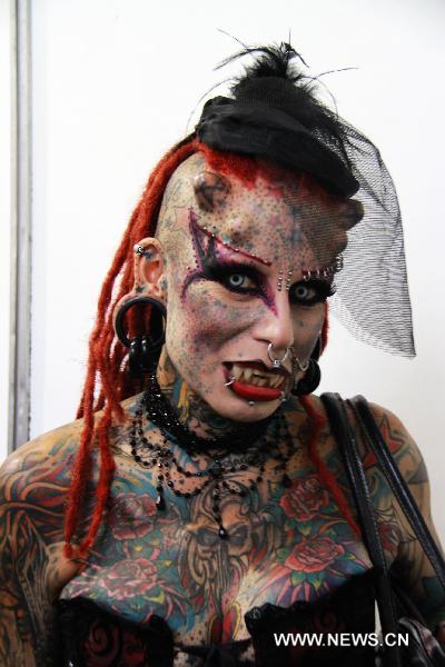 Mexican tattoo artist Krisderna known as the vampire woman 