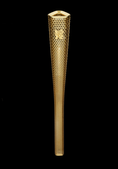 Prototype of London 2012 Olympic Torch was unveiled on Wednesday. The 8,000 perforated circles in the design represent the 8,000 people who will carry the Olympic torch. [Source: Sina.com]