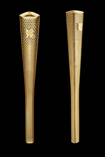 Prototype of London 2012 Olympic Torch was unveiled on Wednesday. The 8,000 perforated circles in the design represent the 8,000 people who will carry the Olympic torch. [Source: Sina.com]