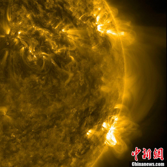 A handout picture shows the Sun as viewed by the Solar Dynamics Observatory on June 9, 2011. The sun is entering a more active phase due to peak in 2013 on a roughly 11-year sunspot cycle, the World Meteorological Organization (WMO) said. Power supplies, air traffic control, communications and satellites can all be disrupted by storms. [Chinanews.com] 