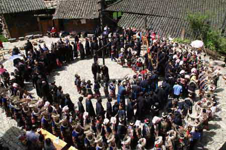 The bronze drum dance of the Miao ethnic group.[Photo/China Daily]