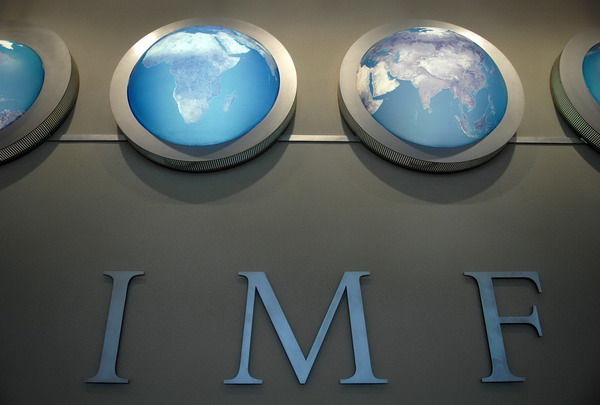 The IMF nameplate is displayed at its headquarters during the World Bank/International Monetary Fund Spring Meetings in Washington in this April 11, 2008 file photo. The IMF has been hit by a cyber attack on its computer systems, an IMF spokesman said on June 11, 2011, highlighting a growing rash of network break-ins at high-profile institutions. [Photo/Agencies]