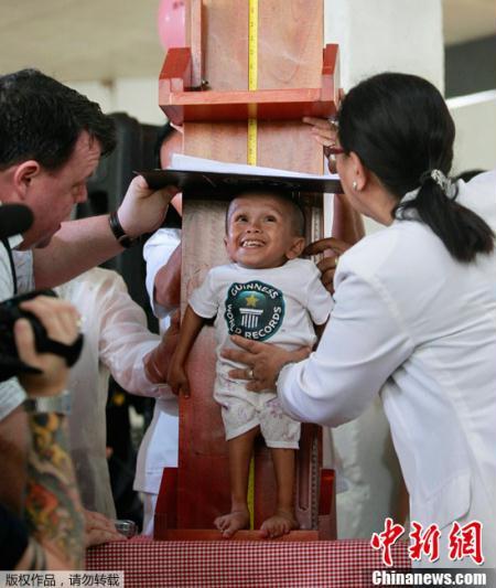 A Filipino blacksmith's son, who stands less than two-thirds of a meter tall, has been declared the world's shortest man. Sunday's announcement came on his 18th birthday, sparking celebrations across his hometown.