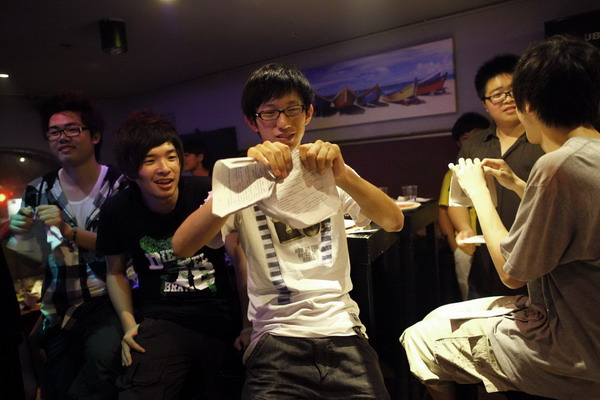Students rip books during a party after National College Entrance Exams in Shanghai June 12, 2011. About 9.33 million students attended China's national college entrance exams or 'gaokao' from June 7 to 8, a fiercely competitive test that is seen as make-or-break for getting ahead. [China Daily/Agencies] 