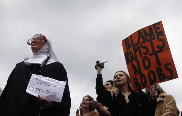 People march in a Slutwalk rally in Sydney June 13, 2011. [China Daily/Agencies]