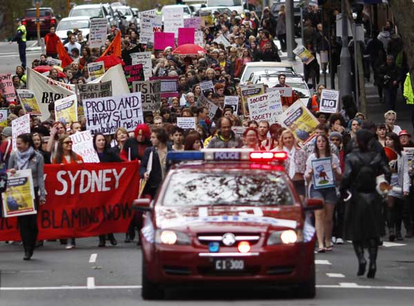 People march in a Slutwalk rally in Sydney June 13, 2011. [China Daily/Agencies]