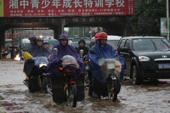 More than 105 people were confirmed killed and another 63 were still missing in floods and landslides triggered by torrential rain. Authorities said on Monday more downpours are forecast to batter central and southern China over the next several days.
