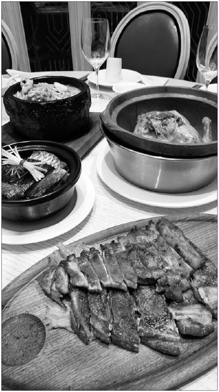 Roast lamb chops, chicken in longjing tea and seafood hotpots makes a delectable spread. Yong Kai / China Daily