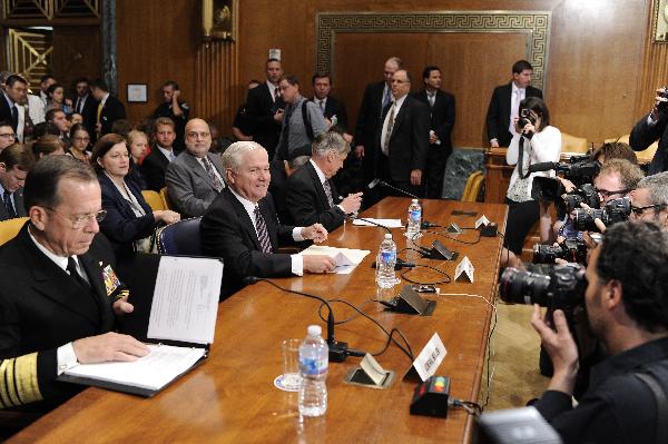 U.S. Defense Secretary Robert Gates (2nd, L) and Chairman of the Joint Chiefs of Staff Mike Mullen attend a Senate Defense Subcommittee hearing on Fiscal Year 2012 budget request for the Defense Department at the Capitol Hill in Washington D.C., capital of the United States, June 15, 2011. Gates said this would be his last appearance before Congressional committee before retiring at the end of June. [Zhang Jun/Xinhua]