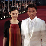 Hong Kong actor Nicholas Tse and his wife, actress Cecilia Cheung, pose as they arrive for the 30th Hong Kong Film Awards presentation ceremony April 17, 2011. 