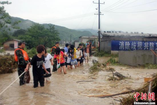 Heavy rain and ensuing floods hit Hubei Province in mid June, forcing the evacuation of thousands. 
