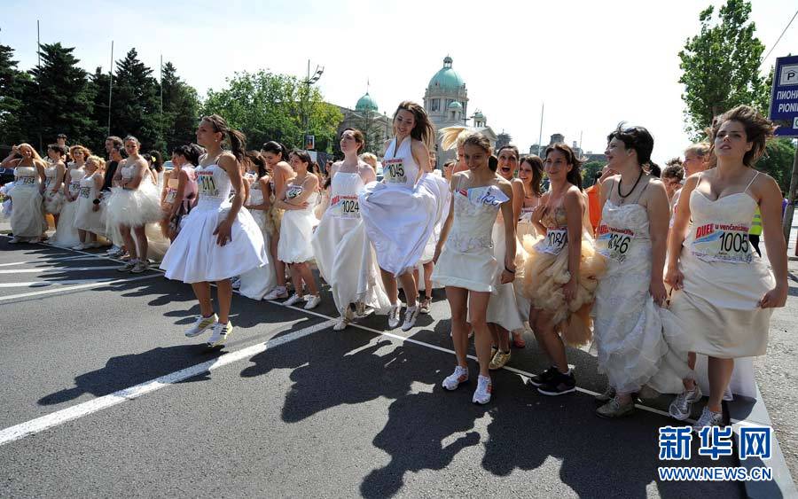 Brides compete in a race in central Belgrade, Serbia, on Sunday. About 50 women participated in the annual bridal race. 