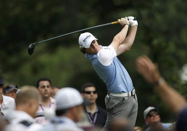 Northern Ireland's Rory McIlroy hits from the fourth tee during the third round of the 2011 U.S. Open golf tournament at Congressional Country Club in Bethesda, Maryland, June 18, 2011. (Xinhua/Reuters Photo) 