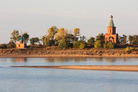 An undated file photo of a church on Heixiazi Island at the confluence of Heilongjiang River and Wusulijiang River that serve as a natural border between China and Russia.