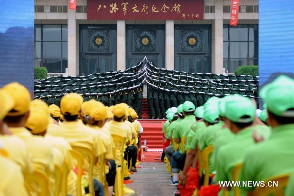 A chorus performs on stage during a songfest to celebrate the 90th anniversary of the founding of the Communist Party of China (CPC) in Wuxiang, north China's Shanxi Province, June 20, 2011. (Xinhua/Fan Minda) (dy) 