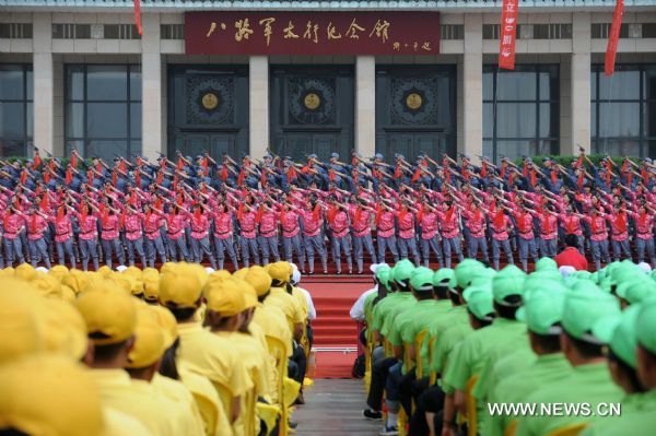 A chorus performs on stage during a songfest to celebrate the 90th anniversary of the founding of the Communist Party of China (CPC) in Wuxiang, north China's Shanxi Province, June 20, 2011. (Xinhua/Fan Minda) (dy) 
