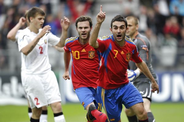 Lopez and Mata of Spain celebrate Lopez's goal against Belarus during the UEFA Under-21 European Championship semifinal football match in Denmark Adriann Lopez (R) and Juan Mata (C) of Spain celebrate Lopez's goal against Belarus during the UEFA Under-21 European Championship semifinal football match at Viborg Stadium in Denmark June 22, 2011.  (Xinhua/Reuters)