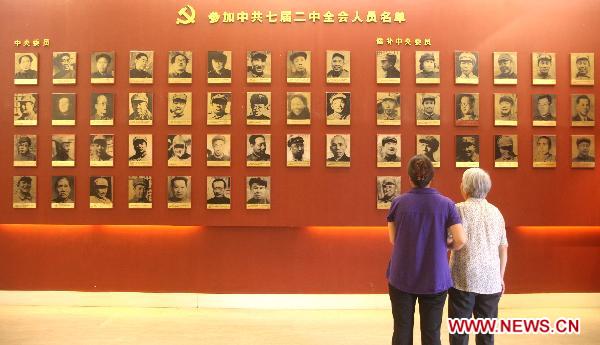 Visitors visit the Xibaipo Memorial Museum at Xibaipo, a village in north China's Hebei Province, June 19, 2011. [Xinhua/Ding Lixin] 