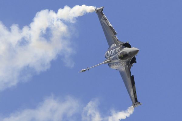 A Dassault Rafale fighter jet takes part in a flying display during the 49th Paris Air Show at the Le Bourget airport A Dassault Rafale fighter jet takes part in a flying display during the 49th Paris Air Show at the Le Bourget airport near Paris June 23, 2011. (Xinhua/Reuters)