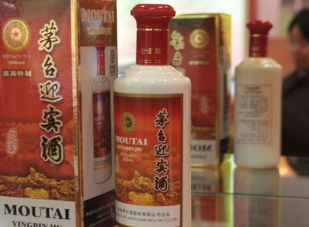 A bottle of Kweichow Moutai liquor is seen on the counter.