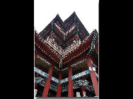 Located in the northwest of the city of Nanchang, Jiangxi Province and on the east bank of the Gan River, Tengwang Pavilion (The Pavilion of Prince Teng) is one of the Four Great Towers of China. It has been destroyed and rebuilt many times over its history. The present building was rebuilt in 1989 on the original site. It is 57.5 meters tall and has nine floors. The building has a total floor area of 13,000 square meters. [白色恶魔/bbs.fengniao]