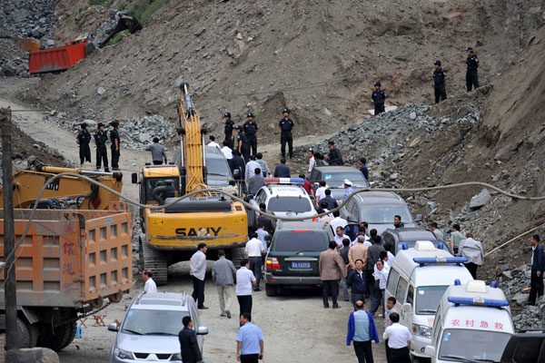 At least nine people were confirmed dead and another four were injured after a landslide Sunday morning at an iron ore dressing factory in north China's Shanxi Province