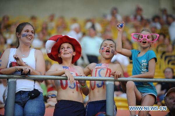 Fans of the U.S. react before the Group C first round match between the United States and the Democratic People's Republic of Korea (DPRK) at the 2011 FIFA Women's World Cup at the Rudolf-Harbig-Stadion in Dresden, Germany, June 28, 2011. (Xinhua/Li Jundong)