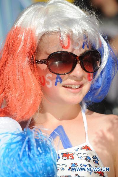A fan of the United States reacts before the Group C first round match between the United States and the Democratic People's Republic of Korea (DPRK) at the 2011 FIFA Women's World Cup at the Rudolf-Harbig-Stadion in Dresden, Germany, June 28, 2011. (Xinhua/Li Jundong) 
