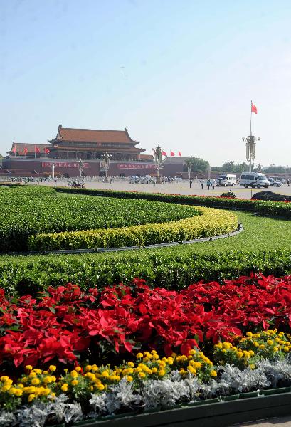 Flower decorations at the Tian'anmen Square in Beijing, capital of China, on June 30. The flower terrace, which measures 15 meters in height and 50 meters in diameter, is set up at the Tian'anmen Square as a celebration for the 90th anniversary of the founding of the Communist Party of China (CPC).