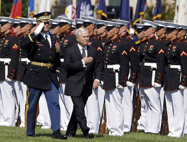 Retiring U.S. Defense Secretary Robert Gates inspects a military honour guard during his farewell ceremony at the Pentagon near Washington, June 30, 2011. 