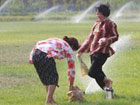 Cities in China see heat wave and heavy rain