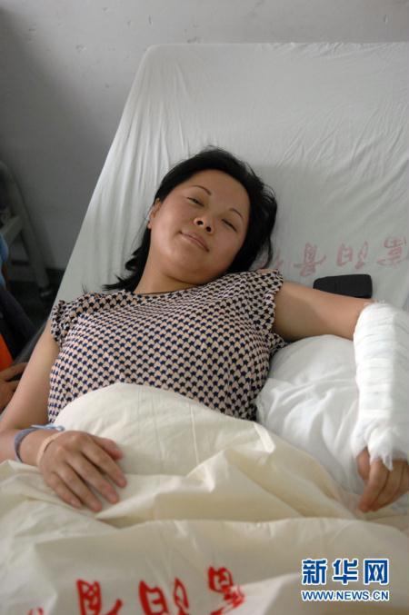 Wu&apos;s arm was injured in the accident. Lying in the emergency room looking pale.