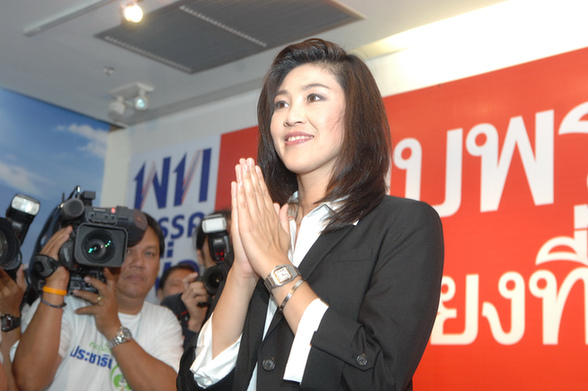 Yingluck Shinnawatra, prime minister candidate from the Phue Thai party and the youngest sister of former Thai Prime Minister Thaksin, celebrates victory with her supporters with big thanks at Pheu Thai Party, Bangkok, Thailand, on July 3, 2011.