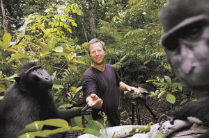 A photographer and two black macaque monkeys appear in a self-portrait took by a black macaque monkey. The female black macaque monkey in a national park in North Sulawesi took the visiting photographer&apos;s unattended camera and managed to take a lot of hilarious self-portraits.